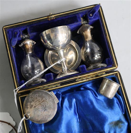 Ecclesiastical silver, including a travelling communion set, cased, a pyx box and a wafer box,